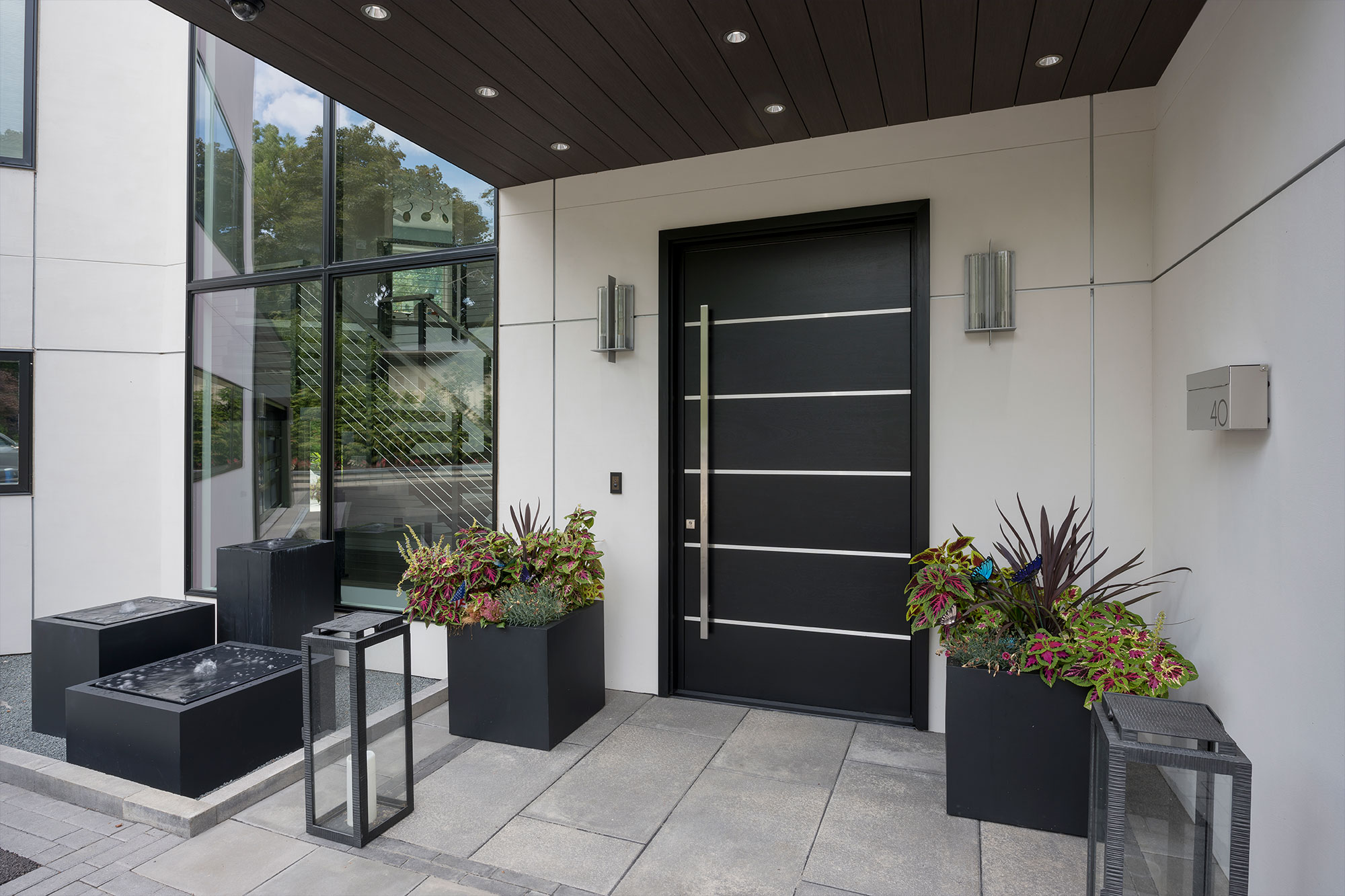 Custom-Made Cast Aluminum Door Installed at a Contemporary Hotel Main Entrance.