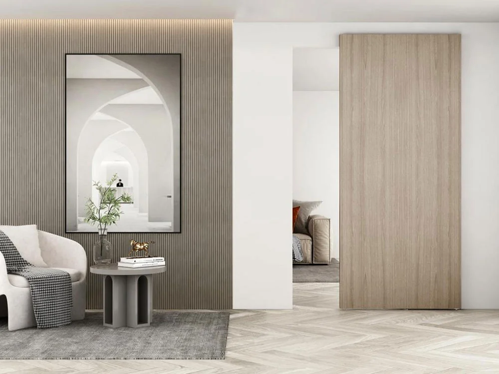 Luxury apartment hallway with a flush-mounted ghost door design.