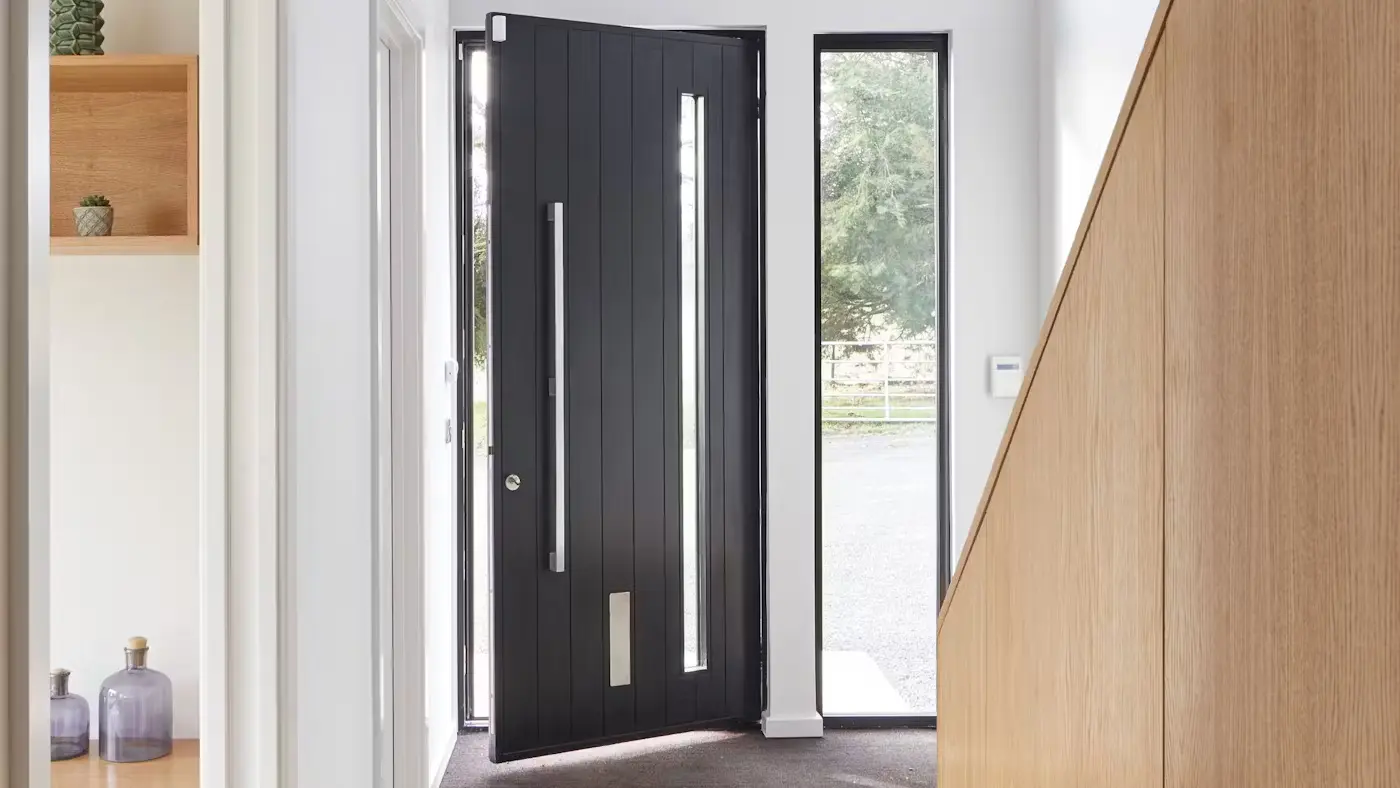 Solid wood entry door with natural finish enhancing home curb appeal.